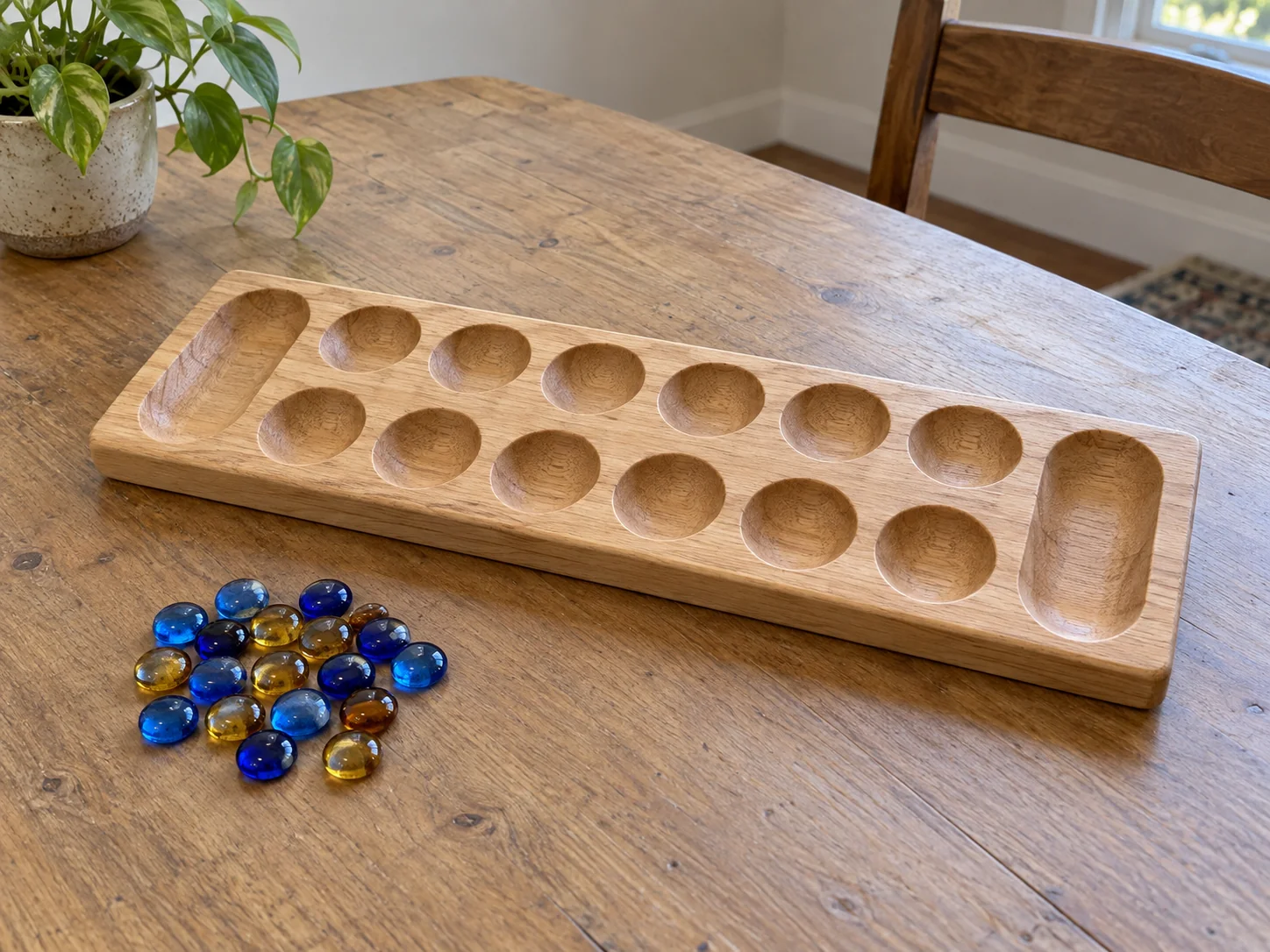 Mancala sowing practice concept with a complete generic empty wooden board and separate glass counters; no active position or exact retail package is demonstrated.